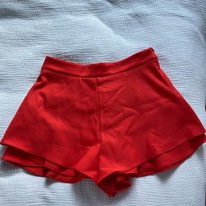 Red flowy shorts in great condition. Size S.